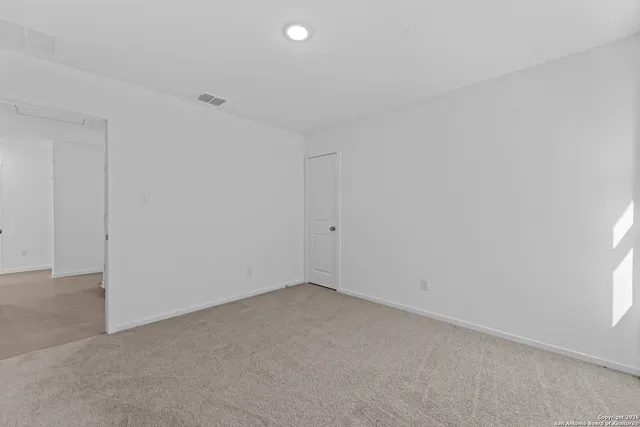 a bathroom with a sink a toilet and a shower