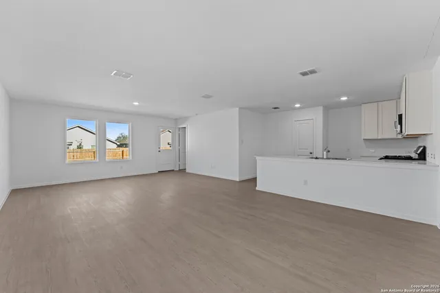 a view of a kitchen with a sink