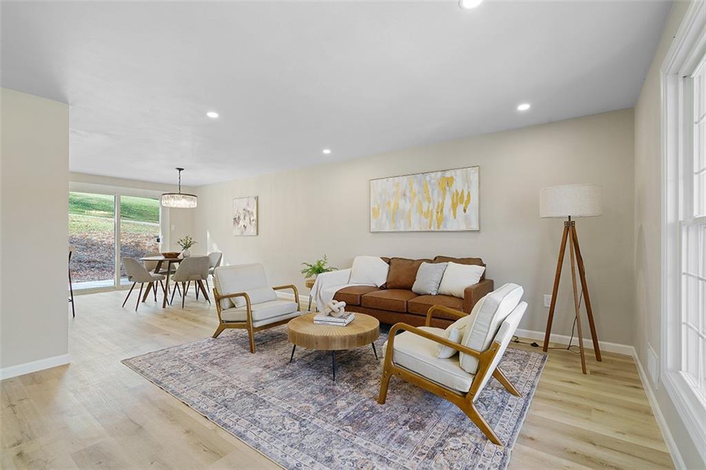 185 Grouse Drive Elizabeth, PA 15037 - Photo 12 of 45 a living room with furniture and a wooden floor
