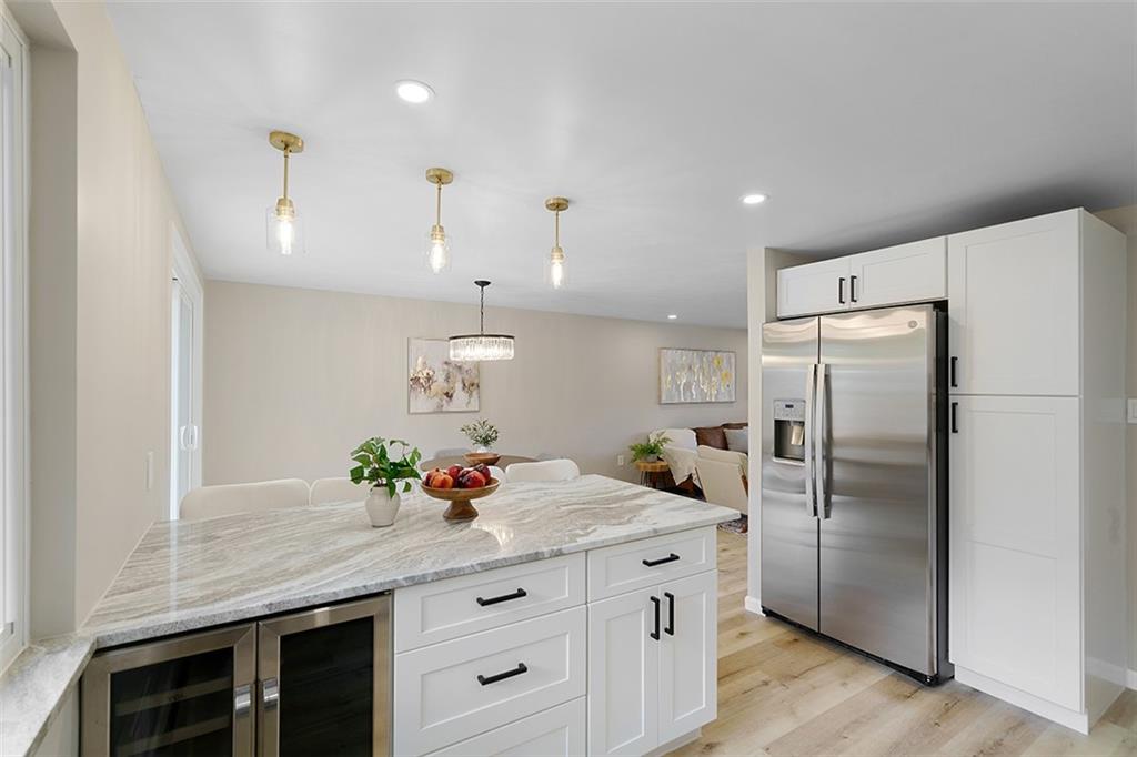 185 Grouse Drive Elizabeth, PA 15037 - Photo 13 of 45 a kitchen with granite countertop a refrigerator and a sink