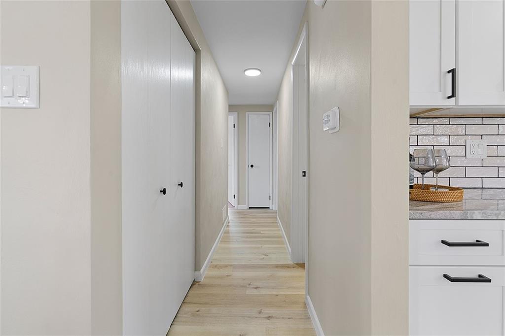 185 Grouse Drive Elizabeth, PA 15037 - Photo 17 of 45 a view of a hallway with wooden floor
