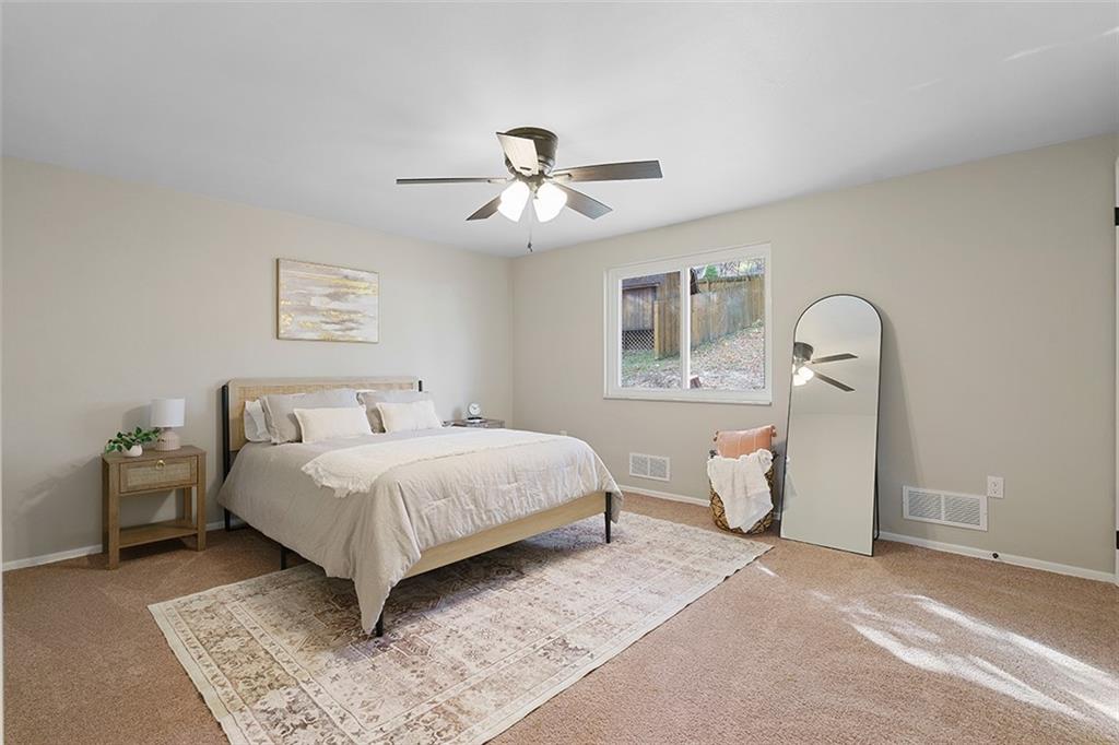 185 Grouse Drive Elizabeth, PA 15037 - Photo 19 of 45 a bedroom with a bed wooden floor and window