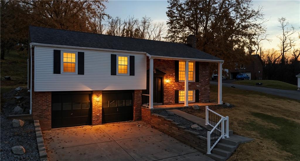185 Grouse Drive Elizabeth, PA 15037 - Photo 2 of 45 a backyard of a house with barbeque oven and outdoor seating