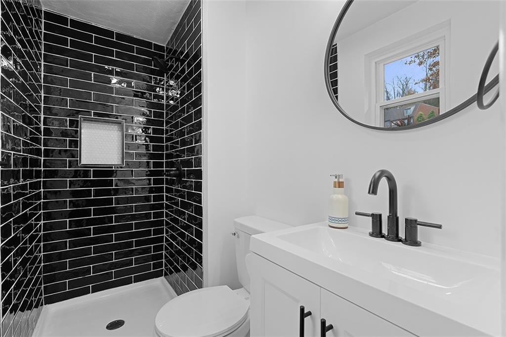 185 Grouse Drive Elizabeth, PA 15037 - Photo 22 of 45 a bathroom with a sink toilet and shower