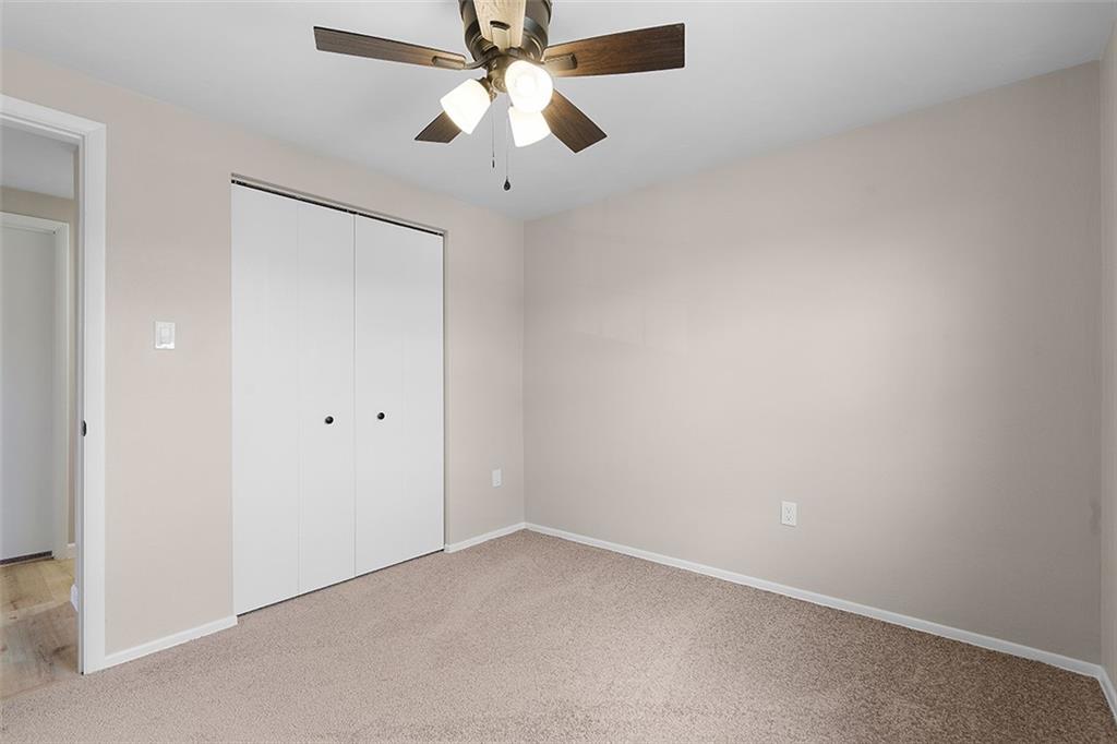 185 Grouse Drive Elizabeth, PA 15037 - Photo 27 of 45 an empty room with a window and a fan