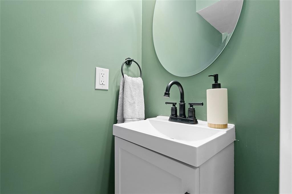 185 Grouse Drive Elizabeth, PA 15037 - Photo 30 of 45 a bathroom with a sink and mirror