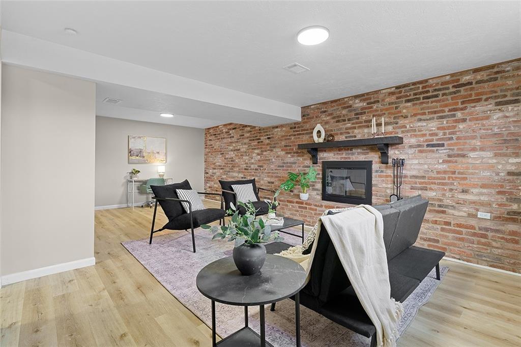 185 Grouse Drive Elizabeth, PA 15037 - Photo 32 of 45 a living room with furniture and a fireplace