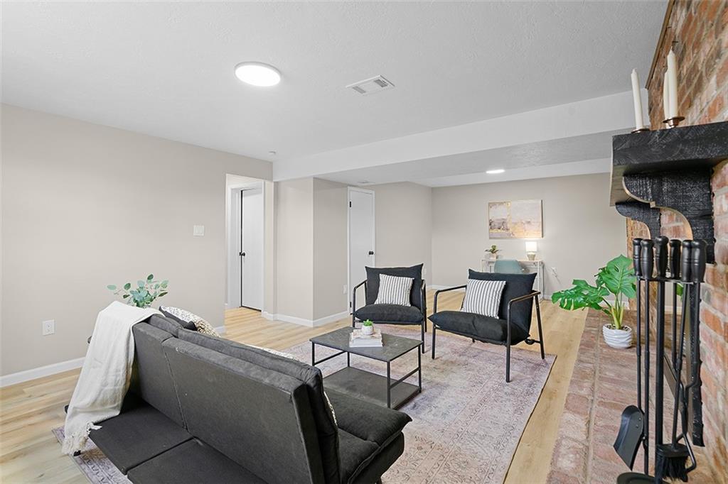 185 Grouse Drive Elizabeth, PA 15037 - Photo 33 of 45 a living room with furniture and a fireplace