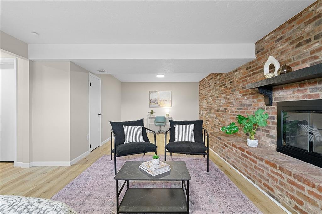 185 Grouse Drive Elizabeth, PA 15037 - Photo 34 of 45 a living room with furniture and a fireplace