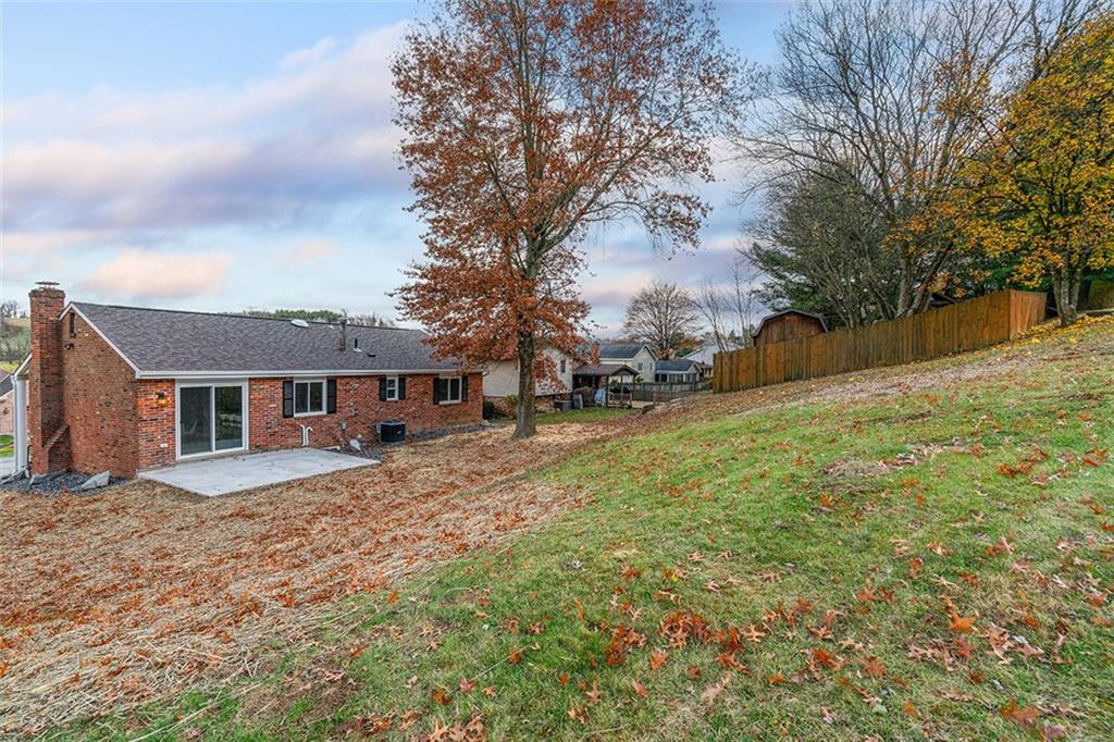 185 Grouse Drive Elizabeth, PA 15037 - Photo 42 of 45 a front view of a house with a yard and trees