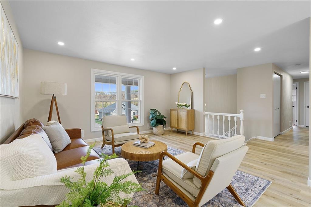 185 Grouse Drive Elizabeth, PA 15037 - Photo 9 of 45 a living room with furniture fireplace and a table