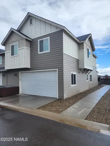 a view of a house with a garage