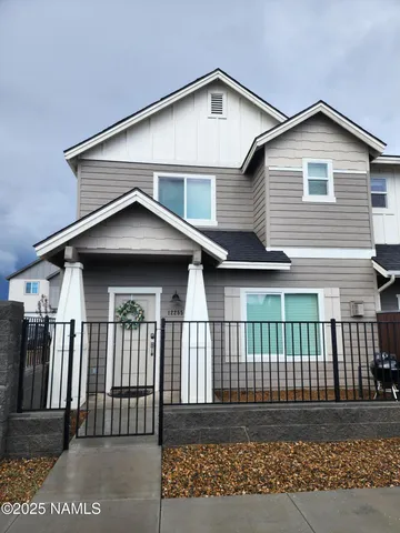 a front view of a house with a porch