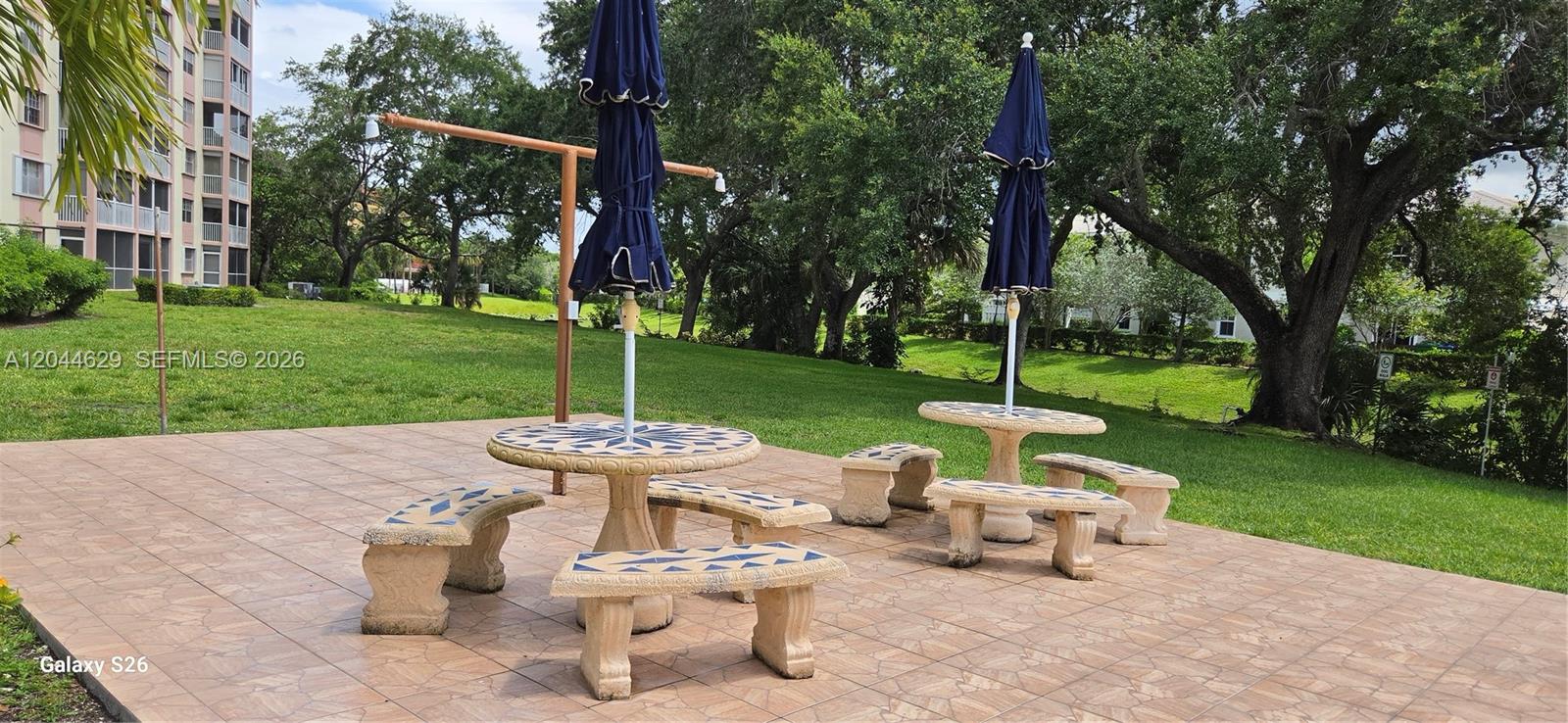 9101 West Sample Road, Unit 306 Coral Springs, FL 33065 - Photo 40 of 41 BBQ area