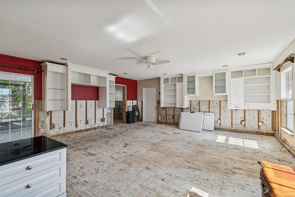 19 Sandpiper Road Tampa, FL 33609 - Photo 25 of 64 a view of a livingroom with wooden floor and a window