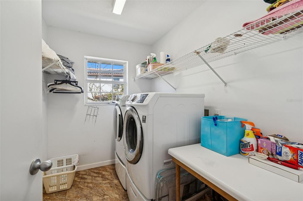 19 Sandpiper Road Tampa, FL 33609 - Photo 33 of 64 a utility room with dryer and washer