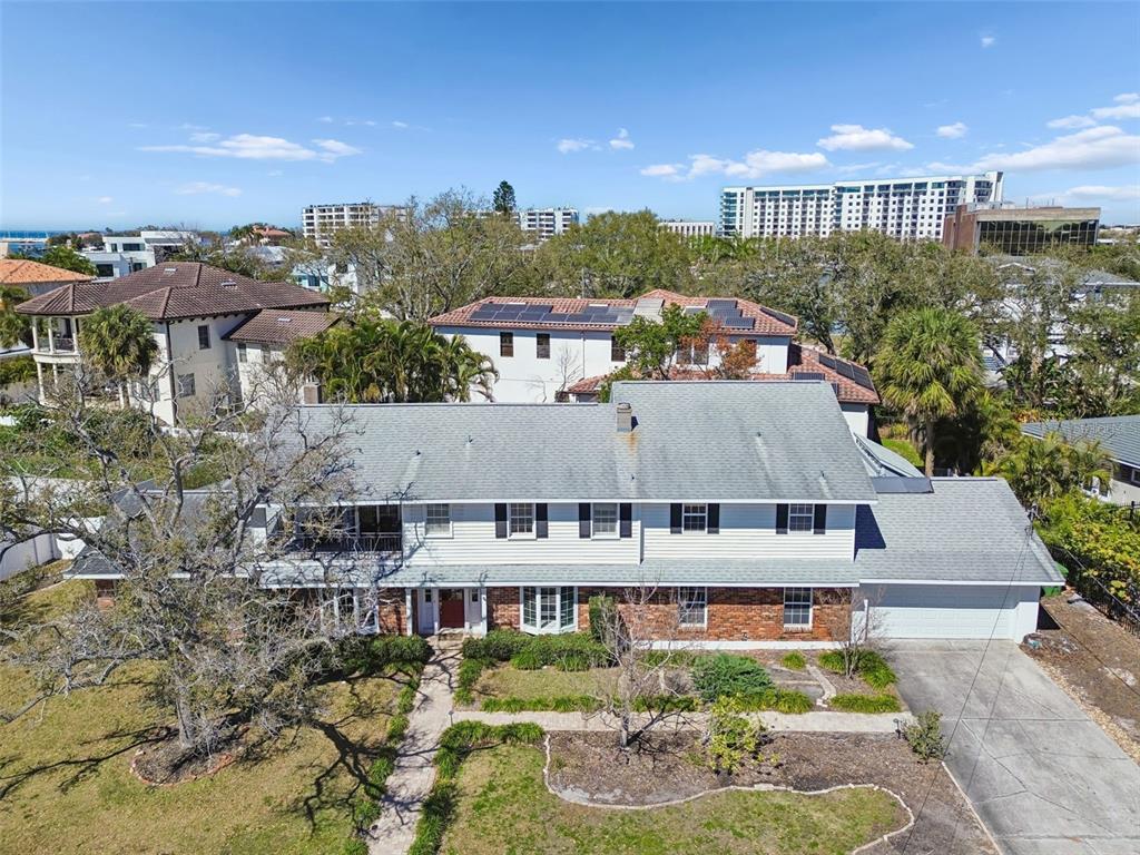 19 Sandpiper Road Tampa, FL 33609 - Photo 64 of 64 a aerial view of a house with swimming pool and a yard