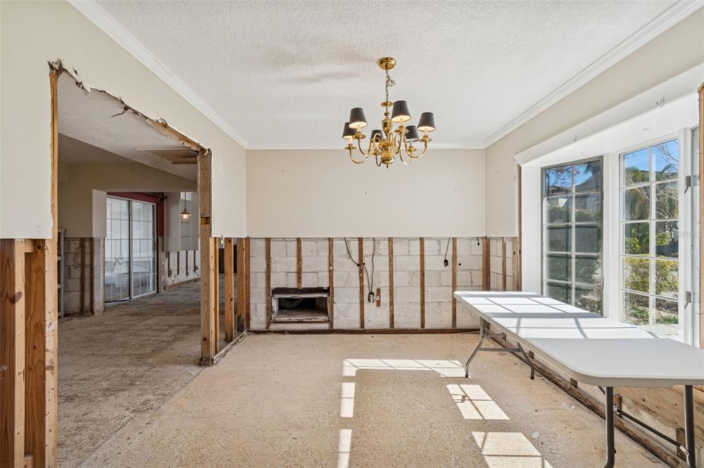 19 Sandpiper Road Tampa, FL 33609 - Photo 7 of 64 a view of a bedroom with furniture window and wooden floor