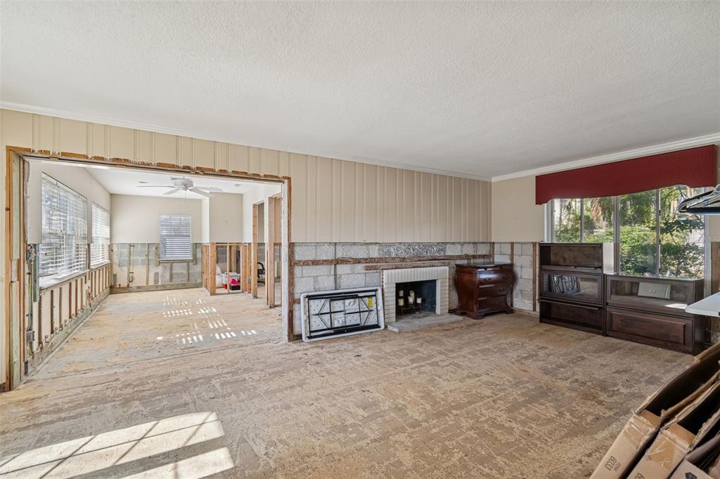 19 Sandpiper Road Tampa, FL 33609 - Photo 9 of 64 a view of livingroom with furniture and fireplace