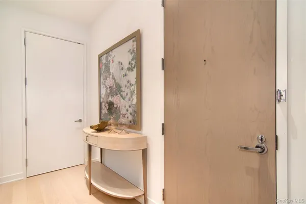 a room with a white cabinet and a sink