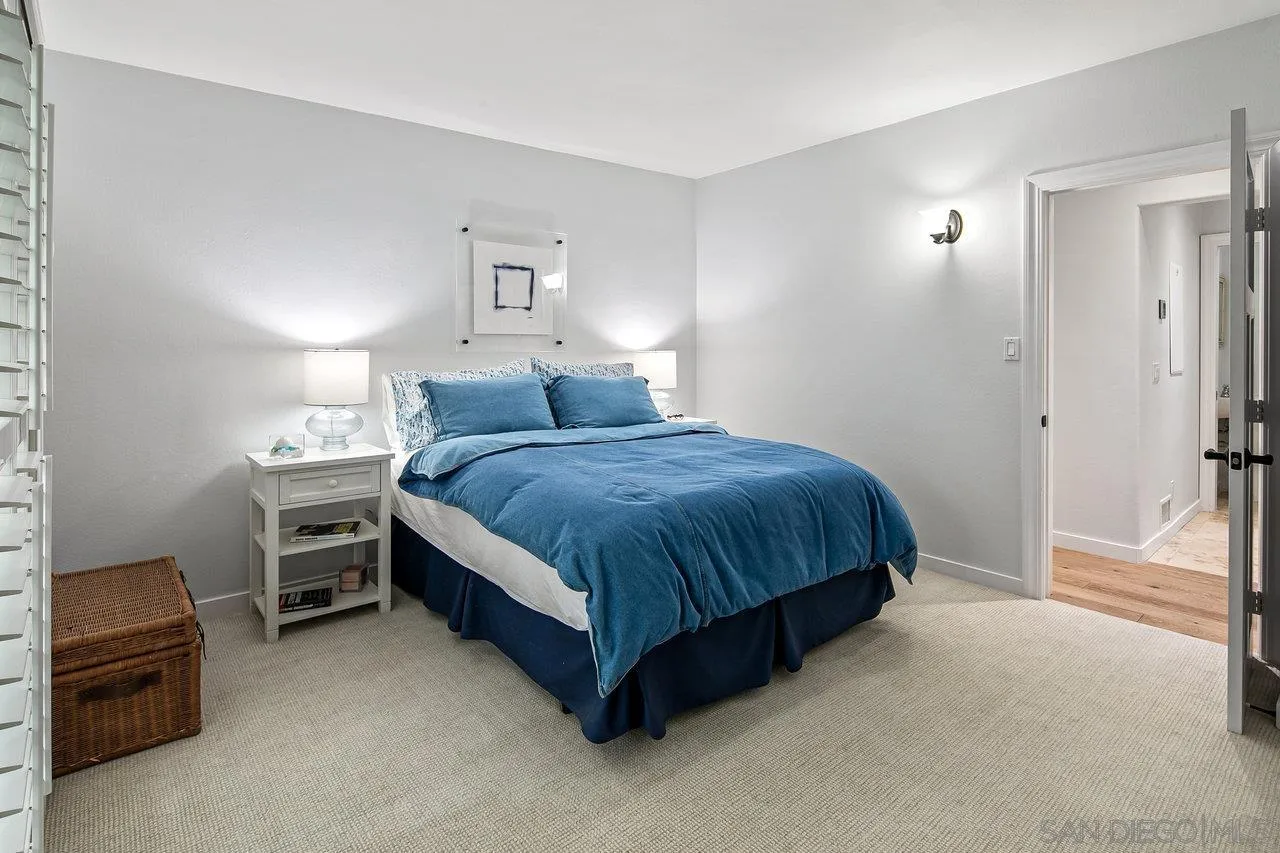 1258 Oak Avenue Carlsbad, CA 92008 - Photo 11 of 29 a bedroom with a bed and a chair