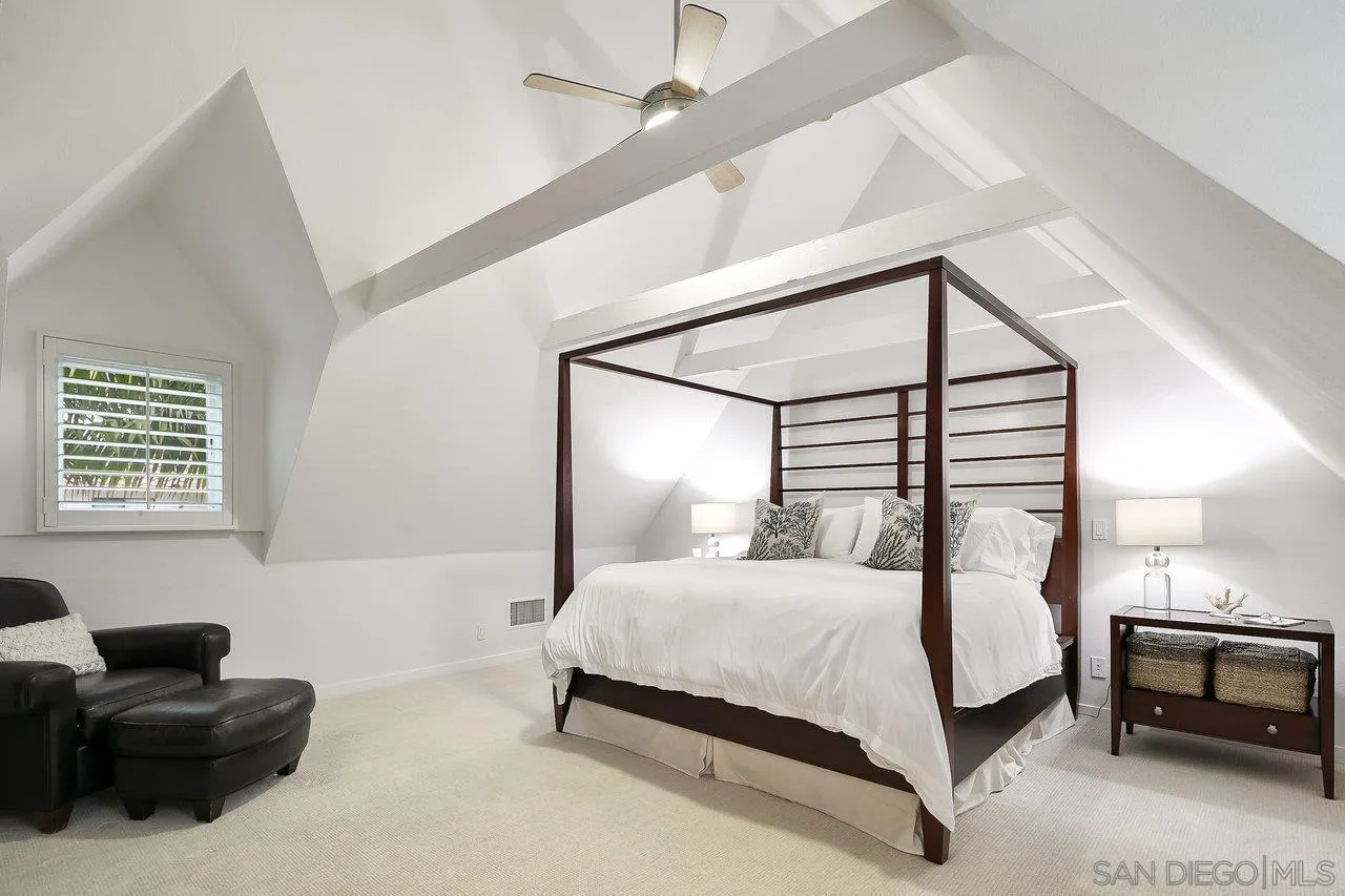 1258 Oak Avenue Carlsbad, CA 92008 - Photo 17 of 29 a bedroom with a bed and a couch