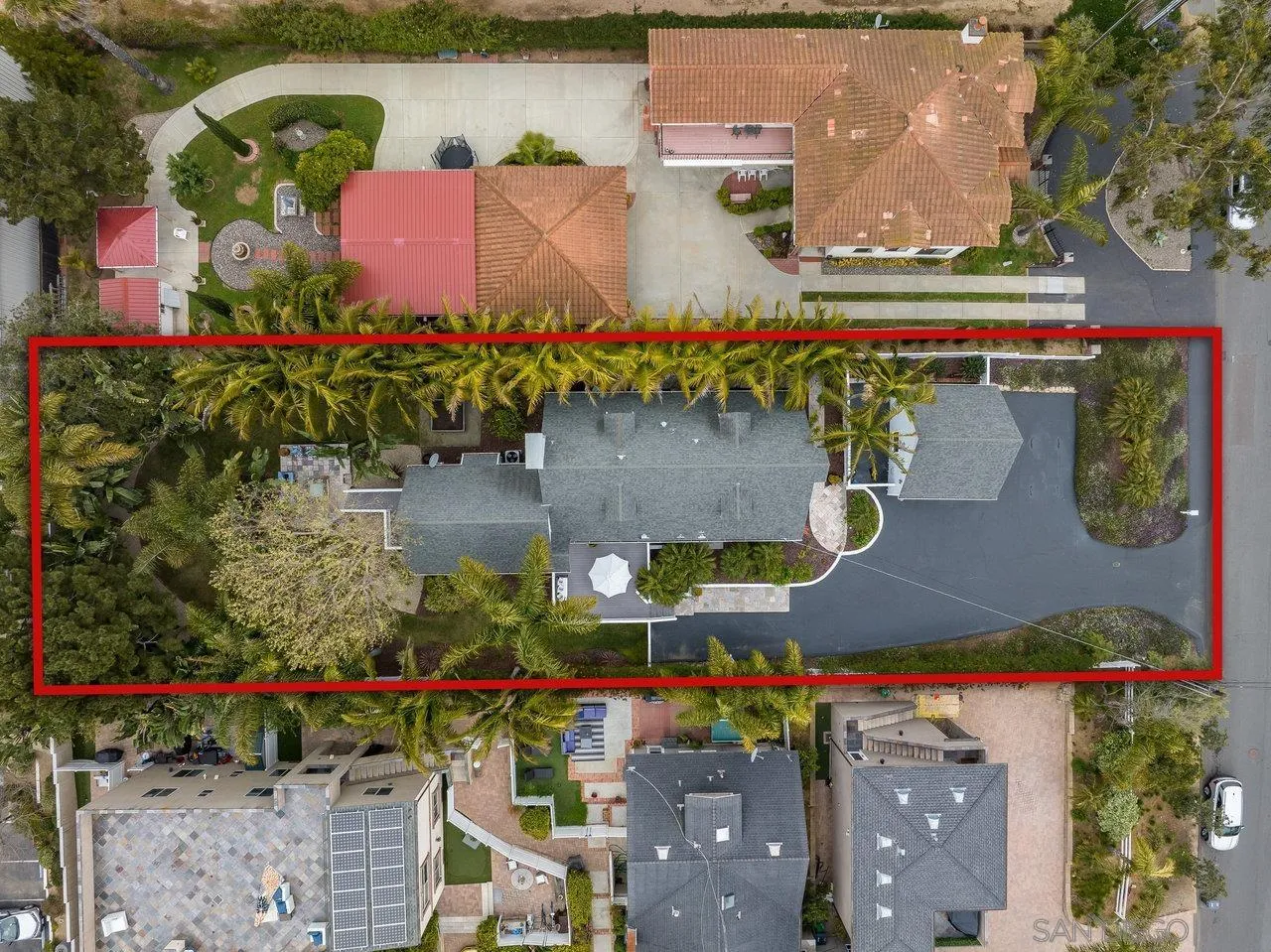 1258 Oak Avenue Carlsbad, CA 92008 - Photo 28 of 29 an aerial view of a house with a lake and a building view