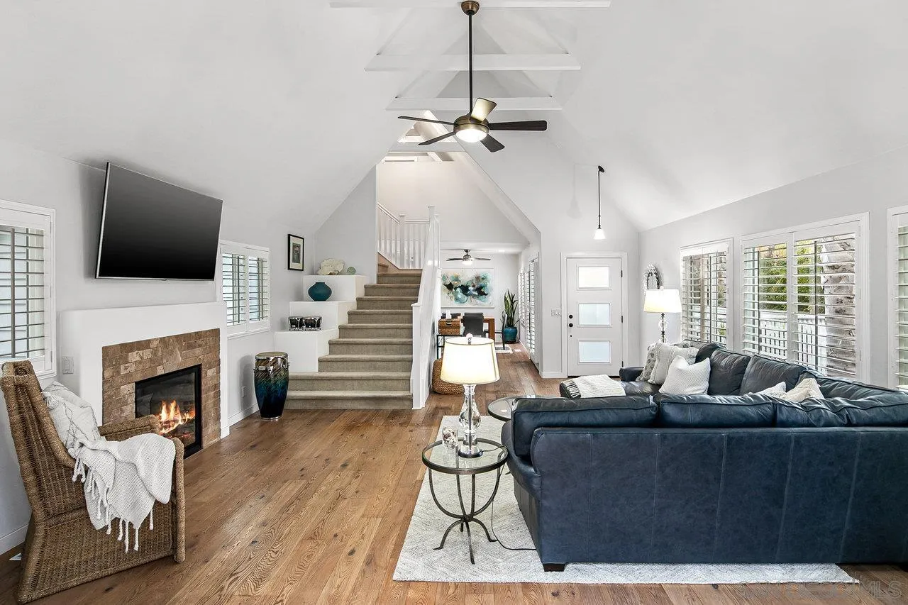 1258 Oak Avenue Carlsbad, CA 92008 - Photo 6 of 29 a living room with furniture fireplace and flat screen tv