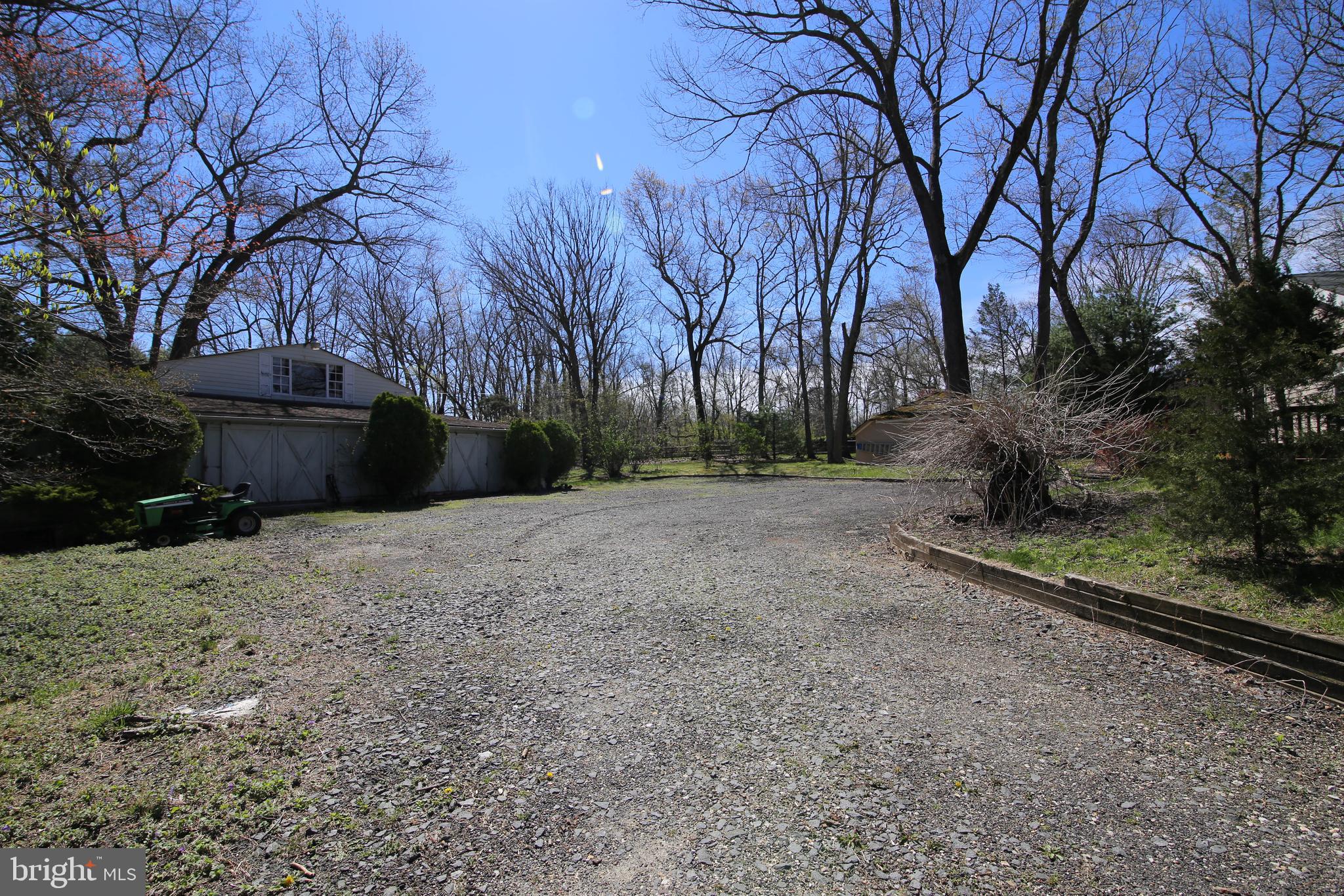 22 Richter Road Tabernacle, NJ 08088 - Photo 51 of 52 a view of a backyard with large trees
