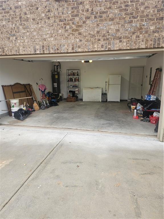 1738 Blue Heron Way Hampton, GA 30228 - Photo 16 of 36 a view of parking garage with cars