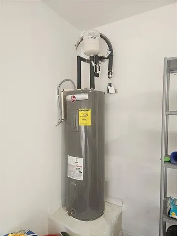 a bathroom with a sink a bathtub and a window