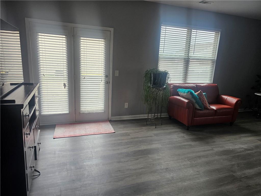 1738 Blue Heron Way Hampton, GA 30228 - Photo 18 of 36 a view of livingroom with furniture and windows