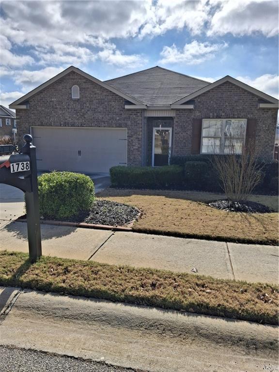 1738 Blue Heron Way Hampton, GA 30228 - Photo 2 of 36 front view of a house