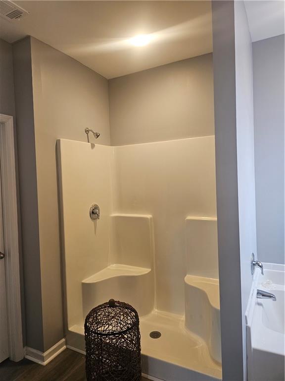 1738 Blue Heron Way Hampton, GA 30228 - Photo 21 of 36 a bathroom with a tub