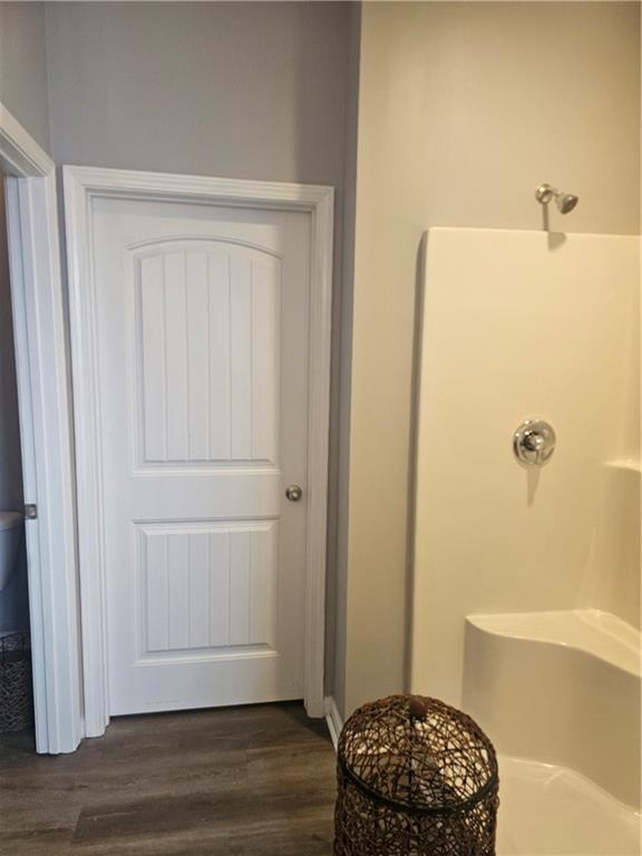 1738 Blue Heron Way Hampton, GA 30228 - Photo 22 of 36 a bathroom with a bathtub and shower