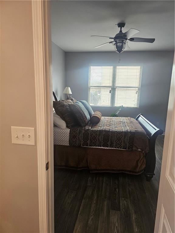 1738 Blue Heron Way Hampton, GA 30228 - Photo 27 of 36 a bedroom with a bed and a window