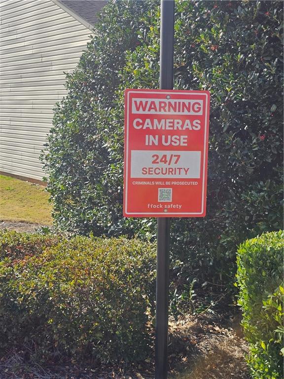 1738 Blue Heron Way Hampton, GA 30228 - Photo 29 of 36 a sign on the side of a road