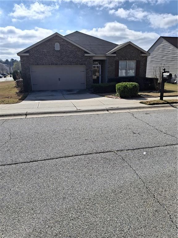 1738 Blue Heron Way Hampton, GA 30228 - Photo 3 of 36 a house view with a outdoor space
