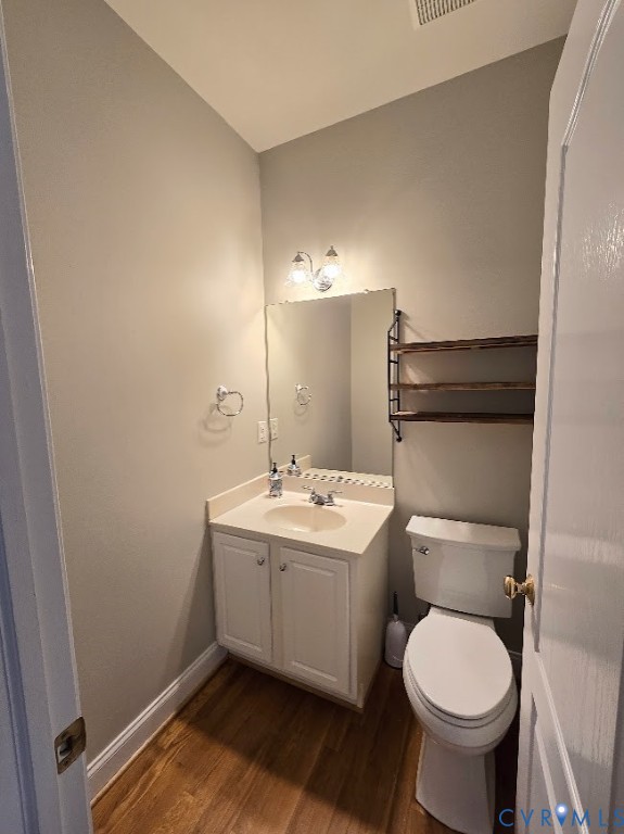 16406 Benmore Road Moseley, VA 23120 - Photo 12 of 32 a bathroom with a toilet sink and mirror
