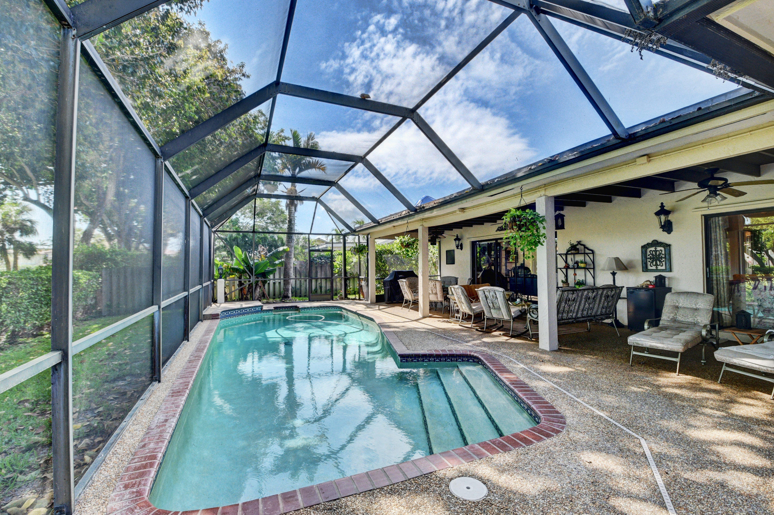 4045 Birchwood Drive Boca Raton, FL 33487 - Photo 29 of 54 Exterior Back & Sceened Pool