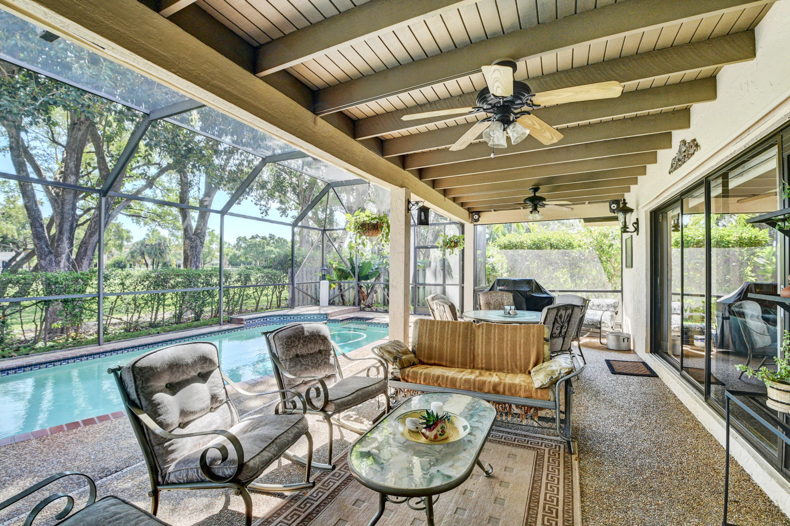 4045 Birchwood Drive Boca Raton, FL 33487 - Photo 31 of 54 Patio & Screened Pool