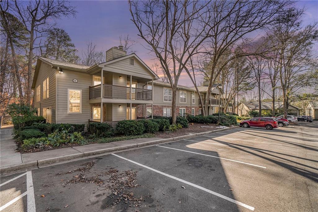 2901 Lenox Road Northeast, Unit 901 Atlanta, GA 30324 - Photo 16 of 18 a street view along with residential houses