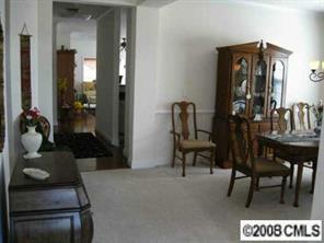 1033 Peridot Court Fort Mill, SC 29708 - Photo 2 of 8 a view of a livingroom with furniture and a dining table