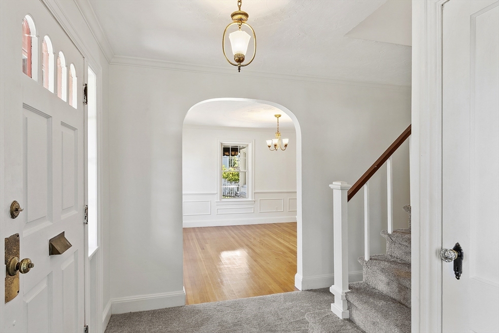 256 Massasoit Road Worcester, MA 01604 - Photo 12 of 33 a view of a hallway view with wooden floor and staircase