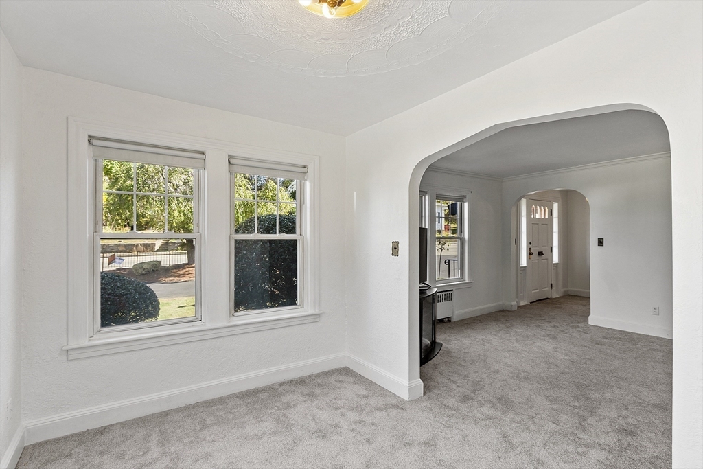 256 Massasoit Road Worcester, MA 01604 - Photo 17 of 33 an empty room that has a window