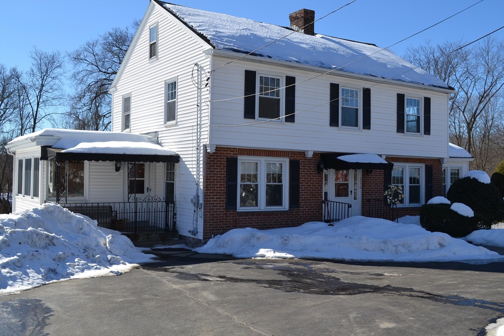 256 Massasoit Road Worcester, MA 01604 - Photo 2 of 33 a front view of a house with a porch