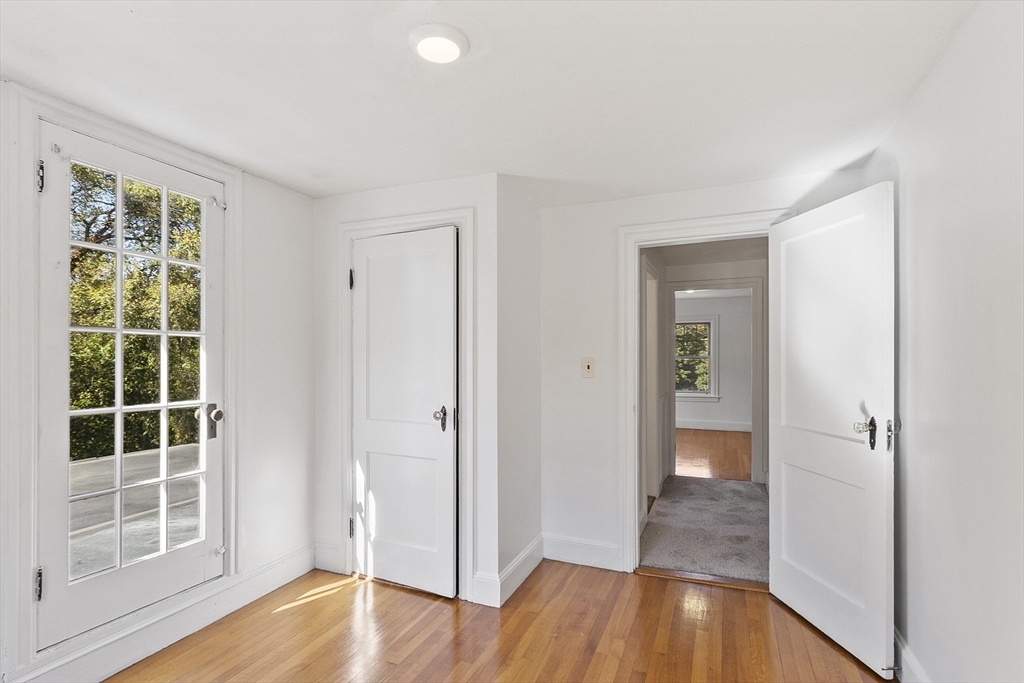 256 Massasoit Road Worcester, MA 01604 - Photo 30 of 33 a view of wooden floor in an empty room with a window