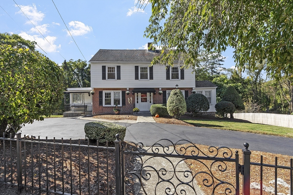 256 Massasoit Road Worcester, MA 01604 - Photo 9 of 33 a front view of a house with garden
