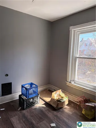 a room with furniture and a window
