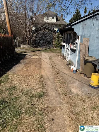a bathroom with a sink a toilet a mirror and vanity